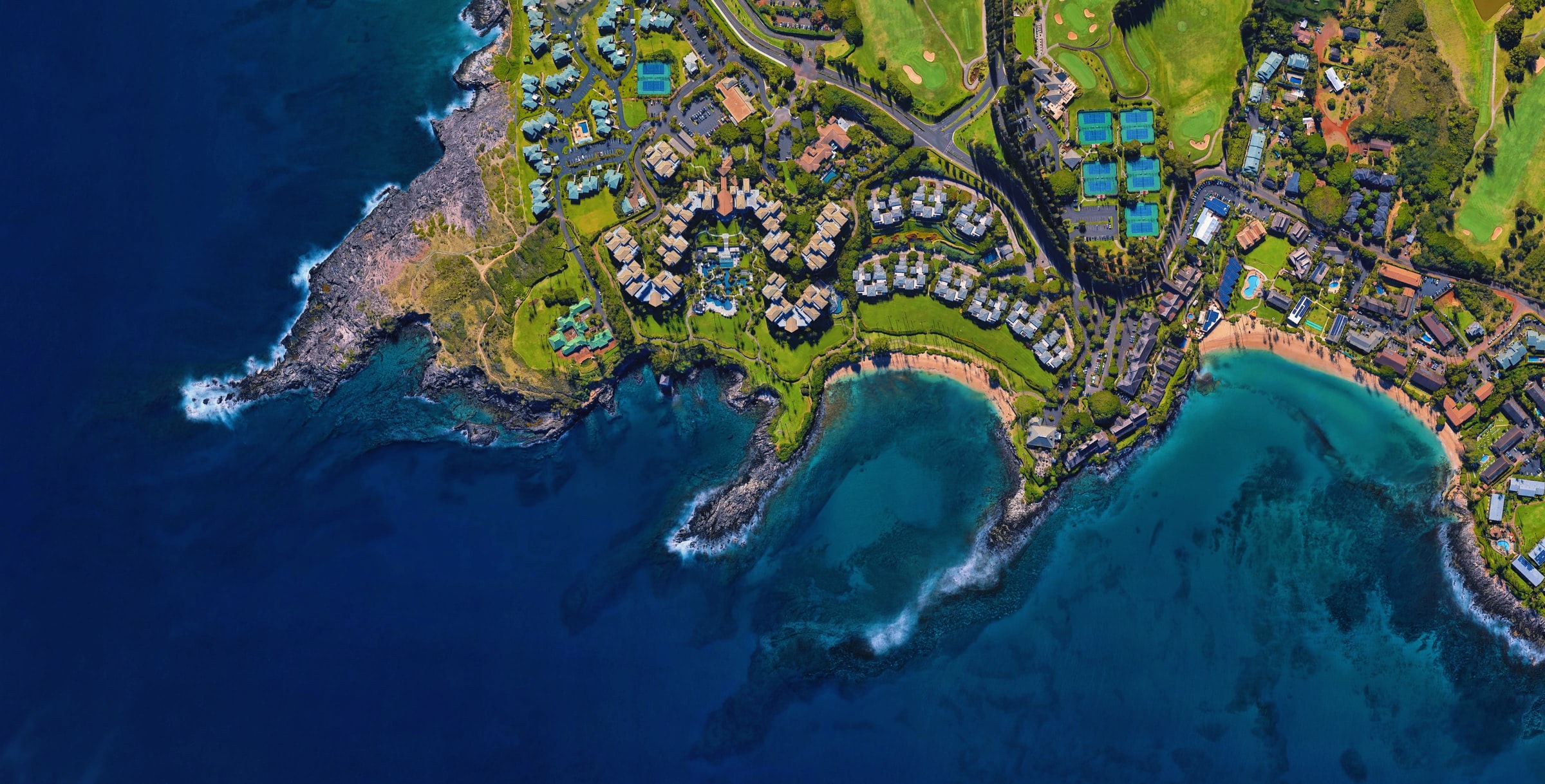 Aerial view of green tropical land and sea