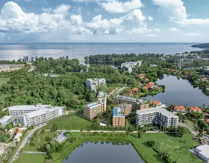 Laguna Aster Phuket luxury condo - aerial view of condo, lakes and sea