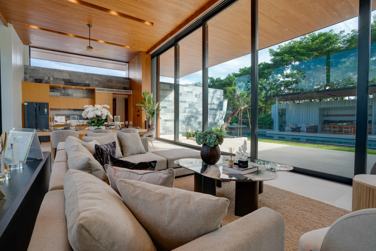 Botanica Montazure luxury villas Phuket - living room with high ceiling overlooking sala
