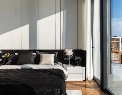Banyan Tree Riverside Residences Bangkok bed and side view